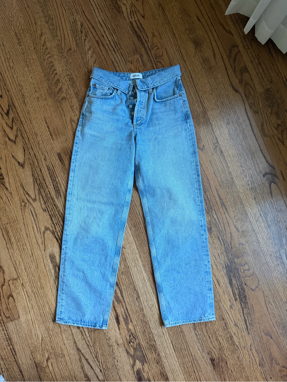 Agolde fold over light washed jeans
